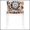 Mademoiselle de Kartell que janta cadeiras
